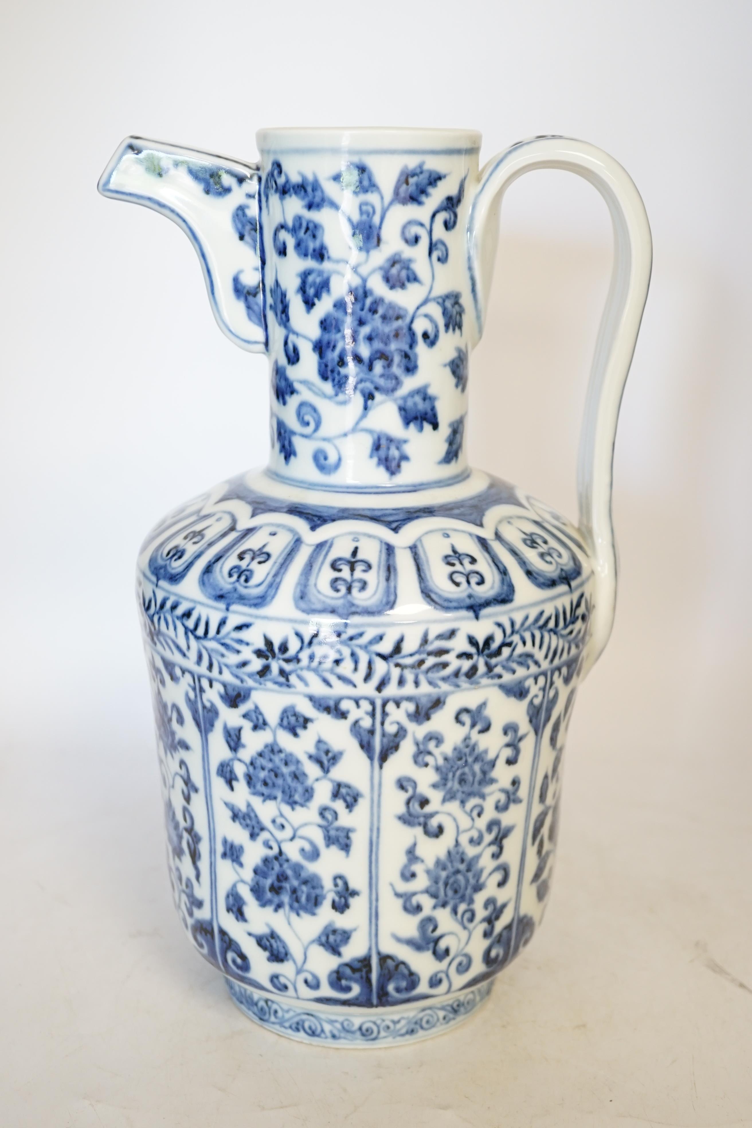 A Chinese blue and white monk’s cap ewer, 34cm high. Condition - good